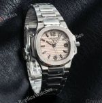 RRR Factory Patek Philippe Nautilus Cal.E 23-250SC Movement 32mm Light Pink Face White Gold Bezel Women Watch